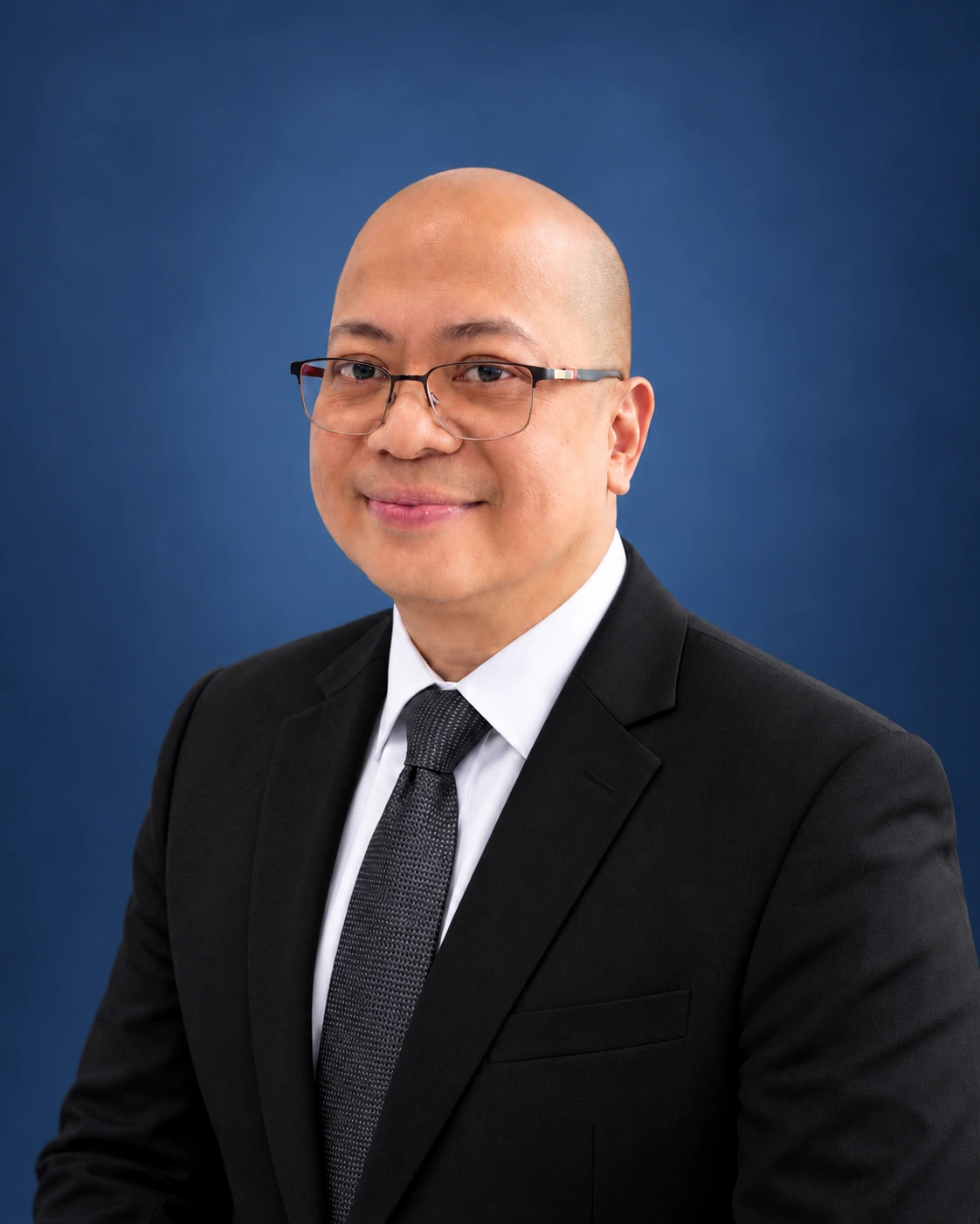Portrait of Nono Reyes, Senior Accountant, Finance and Administration